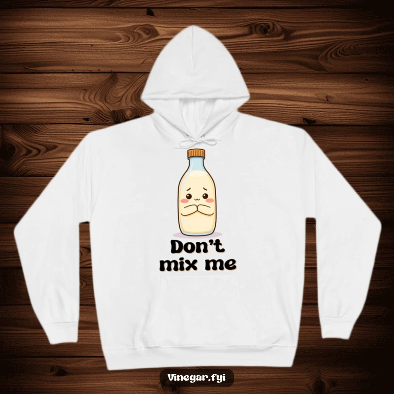 Funny hoodie featuring an unimpressed vinegar bottle crossing its arms, judging milk, a warm and witty statement piece.