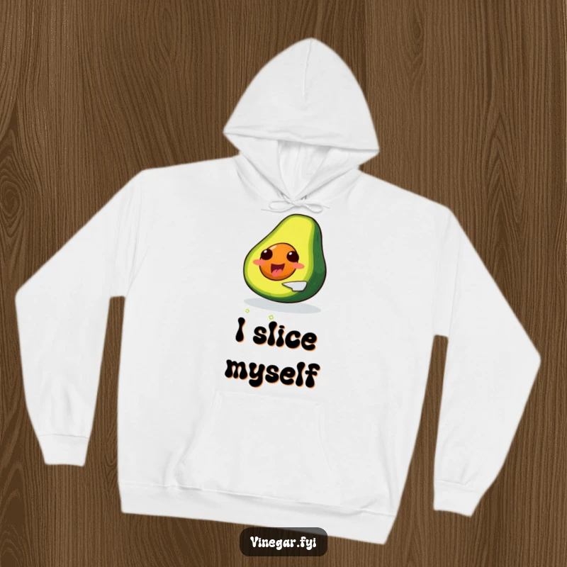 Funny, delighted avocado slicing itself with a tiny knife, on a soft hoodie.