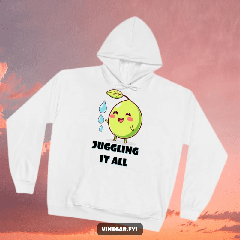 Funny hoodie featuring a wobbly green lime character smiling, juggling droplets, offering comfortable humor and vibrant style.