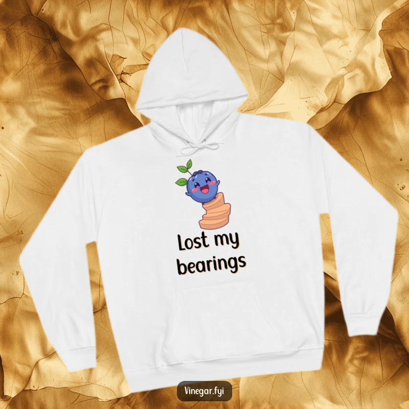 Funny hoodie illustrating a surprised blueberry rolling with glee down a spiral staircase, offering warmth and a whimsical touch.