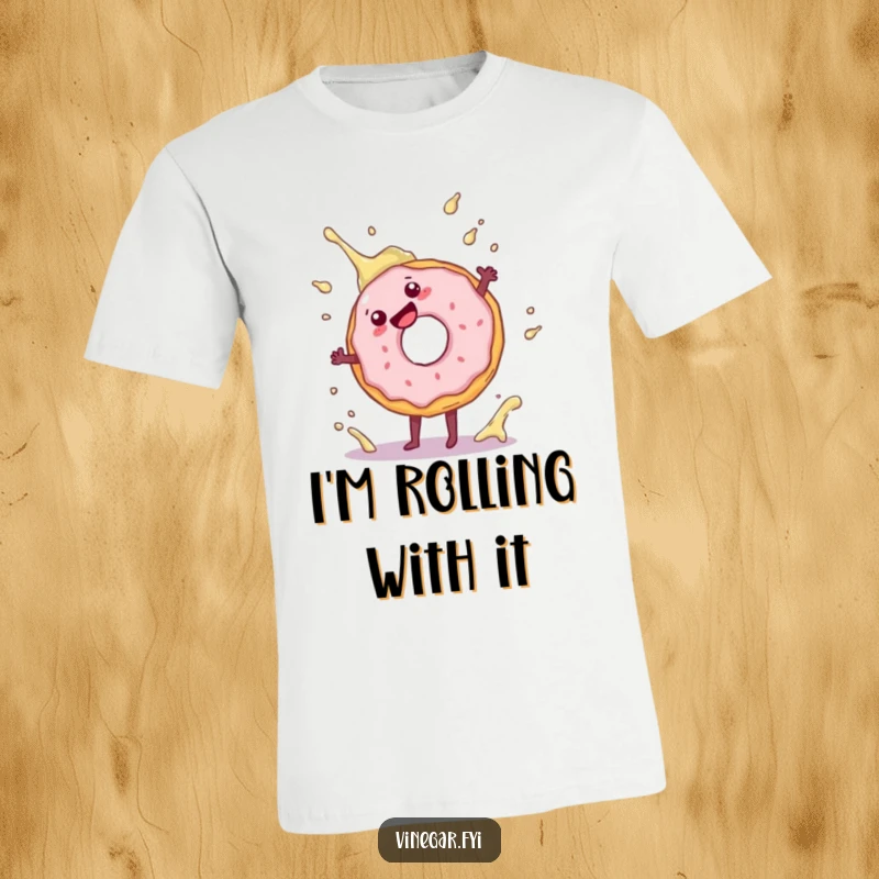 Funny donut t-shirt featuring a playful donut doing a energetic cartwheel, next to a vinegar splash, perfect for laughs.