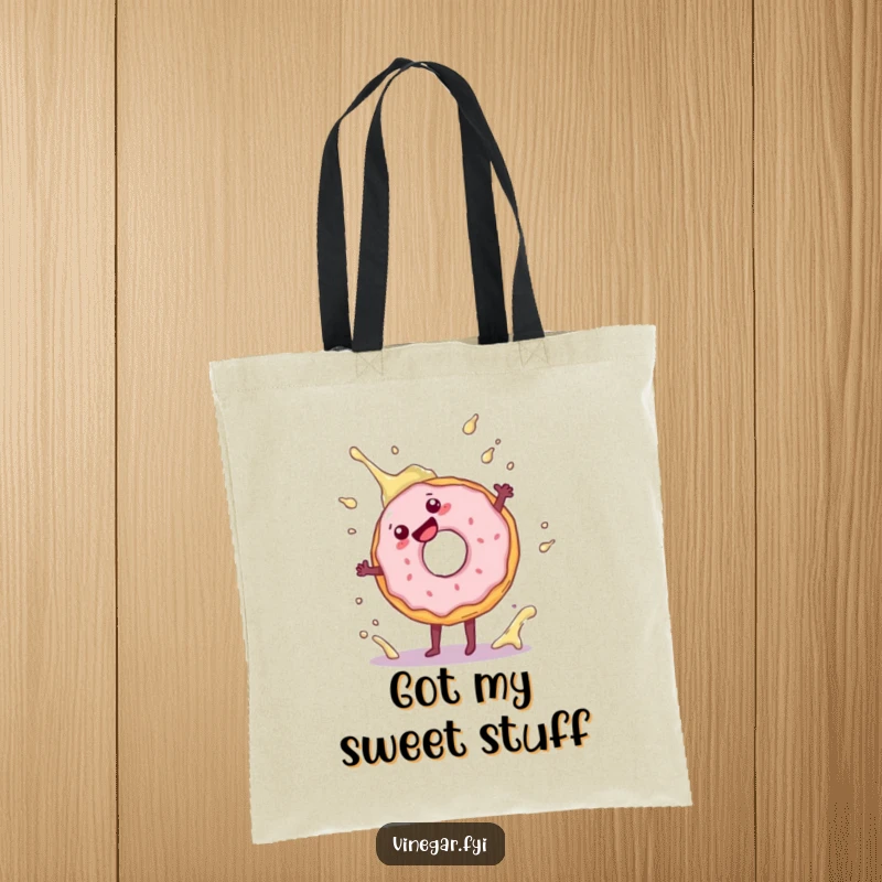 Funny tote bag featuring a playful donut doing a cartwheel, splashing near vinegar, a practical yet humorous accessory.